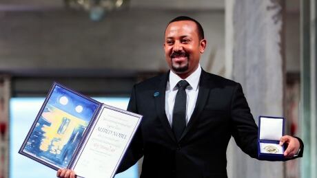 Ethiopia's Prime Minister Abiy Ahmed poses for the media after receiving the Nobel Peace Prize during the award ceremony in Oslo, Norway on Tuesday. Norway Nobel Peace