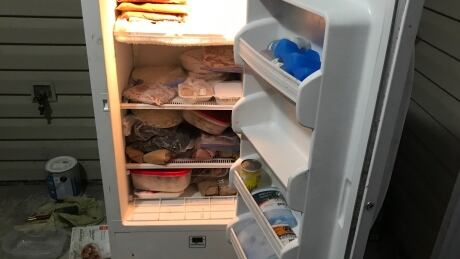 Sharla Marr's freezer in her carport. She says she's surprised the bear managed to access the location and get into the freezer. Sharla Marr