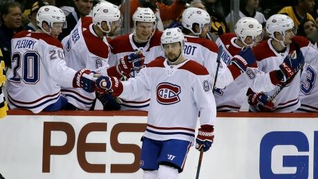 Montreal Canadiens' forward Tomas Tatar celebrates with teammates after scoring during the Habs' 4-1 win over the Pittsburgh Penguins on Tuesday. Canadiens Penguins Hockey
