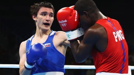 Russia's Olympic boxing team has "unanimously" rejected the conditions laid out by the World Anti-Doping Agency as punishment for manipulating doping data and have threatened to boycott the Games next summer in Tokyo. russian-boxing-160807-1180