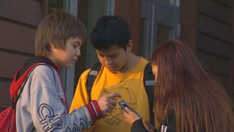 Inside and outside Ahousaht's high school, teens are already glued to their phones. Kids on phones
