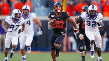 Oklahoma State running back Chuba Hubbard, of Sherwood Park, Alta., announced his intention to return to school and forego the NFL draft for at least one more year through a Twitter video on Monday. hubbard-chuba-011320
