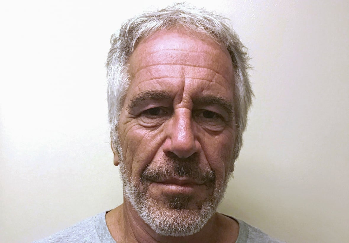 A man with white hair and white beard.