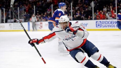 Alexander Ovechkin is seen above celebrating one of his three goals on Saturday afternoon as the Washington Capitals beat the New York Islanders 6-4. Capitals Islanders Hockey