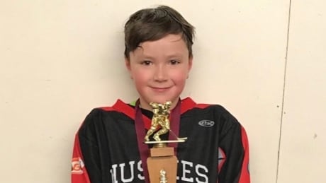 Remembering Ryder: Northern Manitobans hang hockey jerseys for boy lost to cancer