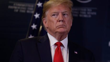 US President Donald Trump joins a news conference at the World Economic Forum in Davos, Switzerland, Wednesday, Jan. 22, 2020. Trump's two-day stay in Davos is a test of his ability to balance anger over being impeached with a desire to project leadership on the world stage. Switzerland Davos Forum Trump