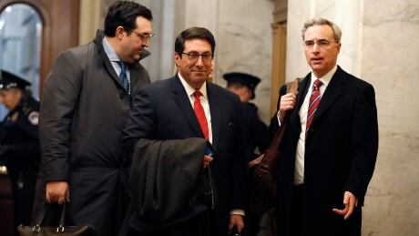 President Donald Trump's personal attorney Jay Sekulow, center, stands with his son, Jordan Sekulow, left, and White House Counsel Pat Cipollone, while arriving at the Capitol in Washington during the impeachment trial of President Donald Trump on charges of abuse of power and obstruction of Congress, Saturday, Jan. 25, 2020 APTOPIX Trump Impeachment