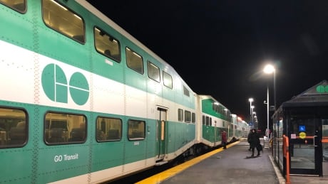 Riders board a GO train at the Acton, Ont., station on Wednesday, January 15, 2020. GO Train riders, GO Transit
