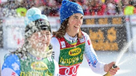 Slovakia's Petra Vlhova, right, flanked by second placed Switzerland's Wendy Holdener, celebrates winning a women's World Cup slalom, in Kranjska Gora, Slovenia, on Sunday. Slovenia Alpine Skiing World Cup