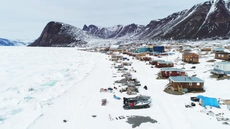 The shoreline and mountain backdrop of Grise Fiord, Nunavut High Arctic Haulers Grise Fiord shoreline