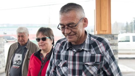 Hereditary chief Na'Moks, right, returns to meetings with federal and provincial ministers in Smithers, B.C., on Feb. 28, 2020. Hereditary chief Na'Moks and Chief Madeek