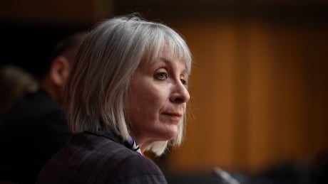 Minister of Health Patty Hajdu listens during a press conference on COVID-19 in West Block on Parliament Hill in Ottawa, on Friday, March 20, 2020. CDA Coronavirus 20200320