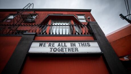 Vancouver's No 5 Orange strip club displays a sign promoting hope amid the COVID-19 pandemic. COVID-19 signs
