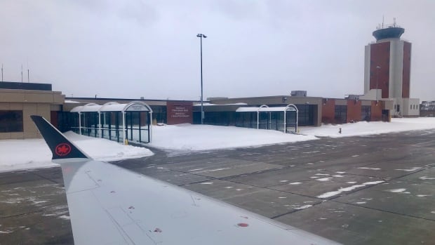 Air Canada flight leaving Charlottetown Airport, P.E.I. Taken January 2020. Airplane at Charlottetown Airport.