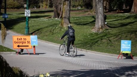 The roads through Stanley Park are closed to encourage people to practice physical distancing while walking and cycling through the park in Vancouver on Wednesday, April 8, 2020. STANLEY PARK ROAD CLOSED