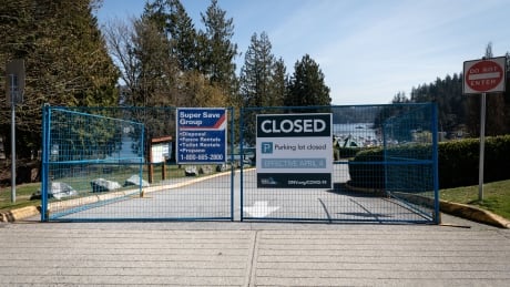 Deep Cove parking lot is closed in North Vancouver on Thursday, April 9, 2020. POLICING CROWDING IN PARKS