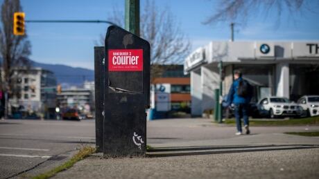 A Vancouver Courier newspaper box is pictured in Vancouver, British Columbia on Thursday, April 9, 2020. VANCOUVER COURIER