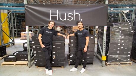 Aaron Spivak, left, and Lior Ohayon, co-founders of Hush Blankets, inside their Toronto warehouse. Hush Blankets