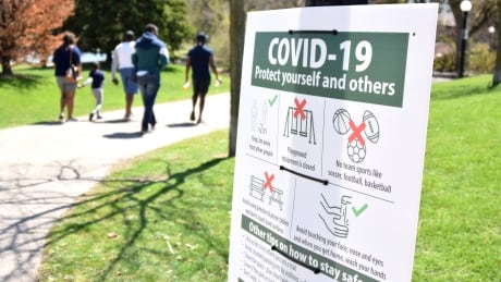 Signs in Victoria Park in Kitchener, Ont., remind people to keep a physical distance between themselves and others. Groups of people enjoyed the sunny weather in the park on Sunday, May 3, 2020. Signs in Victoria Park in Kitchener, Ont., remind people to keep a physical distance between themselves and others. Groups of people enjoyed the sunny weather in the park on Sunday, May 3, 2020.