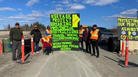 A group of people from Tataskweyak Cree Nation block provincial road 280 into Manitoba Hydro's Keeyask dam site. keeyask blockade