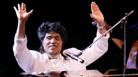In this Aug. 19, 2004, file photo, Little Richard performs at Westbury Music Fair in Westbury, N.Y. Little Richard was laid to rest at his alma mater in north Alabama, Wednesday, May 20, 2020. Mourners, many wearing masks, mourned the rock ‘n’ roll pioneer who died May 9, at 87, but speakers at his memorial service focused not on his musical achievements but his character. (AP Photo/Ed Betz, File) Little Richard