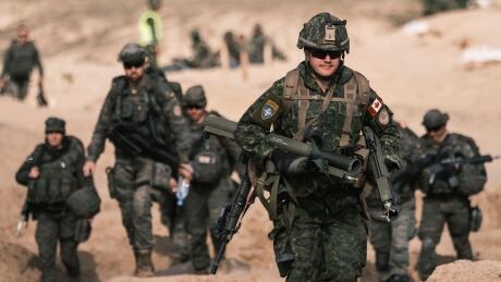 A Canadian soldier carries spent light anti-tank weapons following the conclusion of Exercise Steele Crescendo, which took place outside of Riga, Latvia, in 2020. Canada - Latvia Exercise