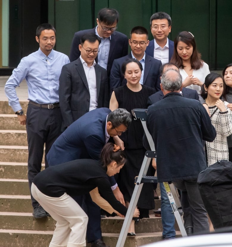 Premature victory lap? Meng Wanzhou poses ahead of momentous court ...