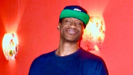 This on Feb. 22, 2019 photo provided by Henry Giron shows George Floyd at Conga Latin Bistro in Minneapolis, where he worked in security. Floyd died in police custody, on Monday, May 25, 2020, after an officer knelt on his neck in Minneapolis. Minneapolis Police Death