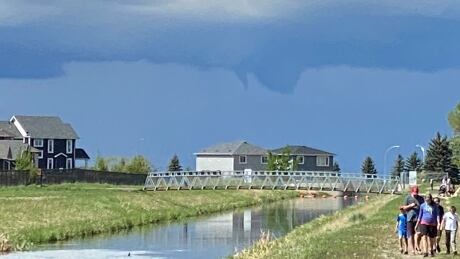 A funnel cloud is pictured near Beiseker on Sunday afternoon. A alert was issued for the area after a tornado touched down south of the village at 4:21 p.m. Funnel cloud beiseker