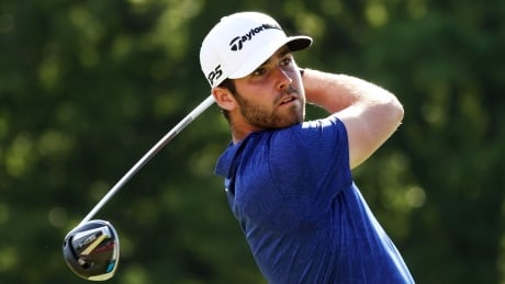 Matthew Wolff of the United States plays his shot from the 18th tee during the third round of the Rocket Mortgage Classic on July 4, 2020. 1254291315