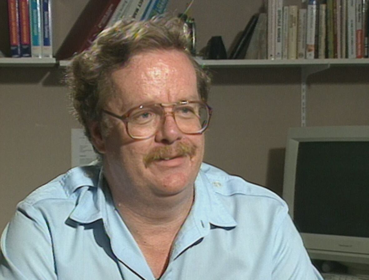 Man with moustache and glasses