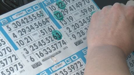Players dabbed their bingo cards in their cars and honked their horns when they hit a winning combination. Bingo