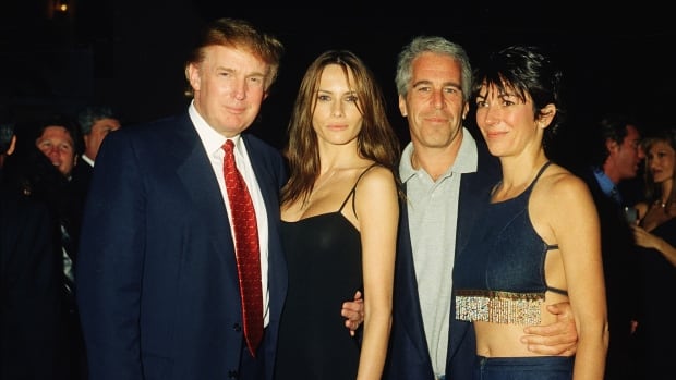 Two man and two women standing together, both men with their arms around the woman, all smiling