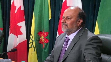 Premier Scott Moe (left) and chief medical health officer Dr. Saqib Shahab are reminding the public to stay vigilant in preventing the spread of COVID-19 as cases continue to rise in the province. Premier Scot Moe Dr. Saqib Shahab