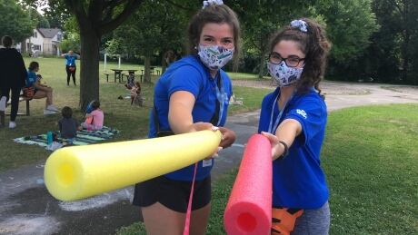 <div>Pool noodles and 'airplane arms': New rules for city-run day camps</div> <div>Pool noodles and 'airplane arms': New rules for city-run day camps</div>