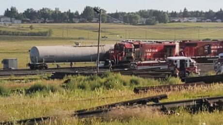 A crane operator works at the scene of a train crash in Moose Jaw. Train Crash at Moose Jaw Aug 5, 2020