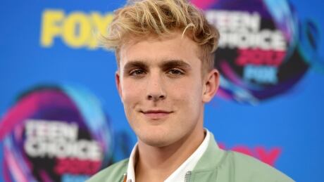 FBI agents including a SWAT team have raided the apparent home of YouTube star Jake Paul in connection with an ongoing investigation. Helicopter video from local TV news showed agents gathering guns from the home that can frequently be seen on Paul's YouTube channel, which has over 20 million followers. People Jake Paul
