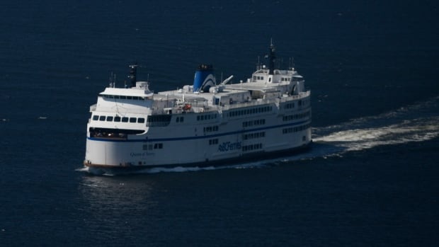 A ferry travels in open water.