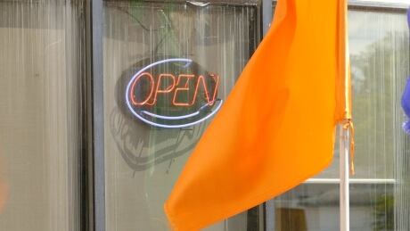 Some businesses in Brandon have re-introduced some restrictions in an effort to try contain a COVID-19 in the southwest Manitoba city. Open sign brandon