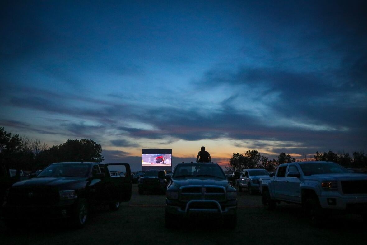Moviegoers pull up a chair to the cinema under the stars in High River