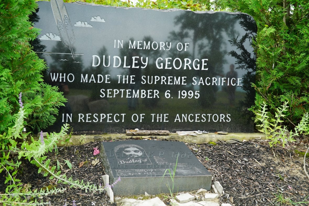 A memorial read, "In memory of Dudley George who made the supreme sacrifice September 6, 1995."