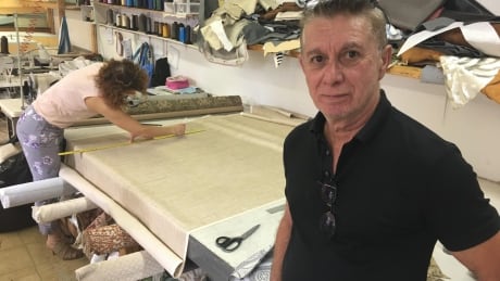 Gyula Szabo co-owns European Upholstery, a business that's operated on Wharncliffe Road South for 60 years. Szabo says a city settlement offer of $657,000 isn't enough for him to move and buy a property with the same earning potential. Giula Szabo European Upholstery