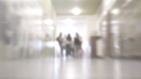 A blurred school hallway. Shutterstock school hallway blurred