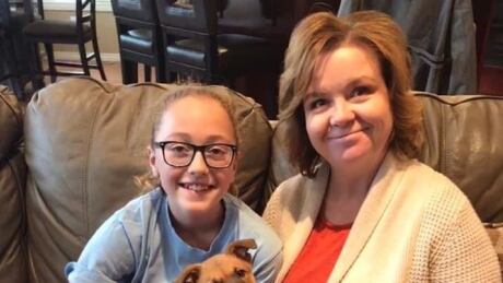 Katelyn and Donna Schell can be seen in this supplied photo. The Schell family says they're on the fence about in-school testing, as she's worried testing healthy children may result in a test not being available for a person in greater need. Donna Schell and Katelyn Schell
