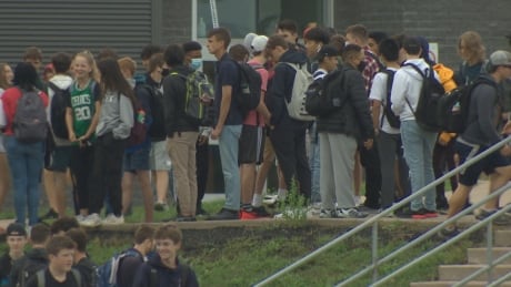 Students gather outside a Halifax high school this week with few masks and little social distancing. Students gather outside a Halifax high school this week with few masks and little social distancing.