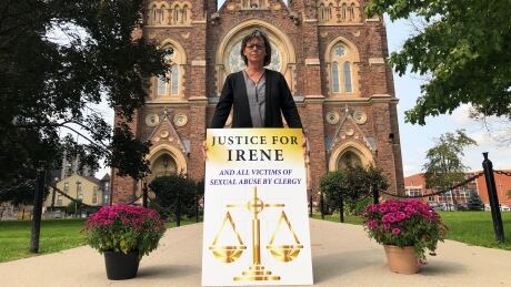 Irene Deschenes stands outside St. Peter's Basilica where she and other sexual abuse survivors protested all day Tuesday. She says they are challenging the Diocese to treat survivors with dignity and compassion, not legal battles. Irene Deschenes
