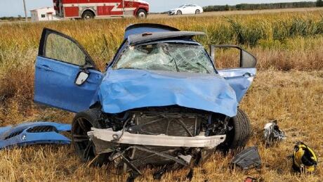 Police say two vehicles were racing on Highway 2 on Monday when one tried to pass a car on the gravel shoulder and ended up rolling several times. Highway racing crash in Manitoba