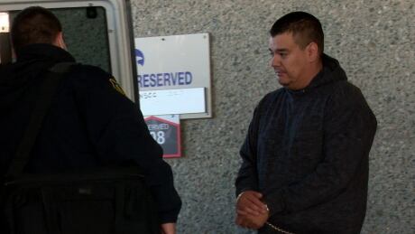 James Colosimo leaves the Yellowknife courthouse on Sept. 16 in shackles following his first court appearance after being charged with murder. James Colosimo