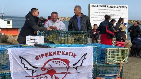 Mi'kmaw fishermen gathered at a wharf in Lower Saulnierville, N.S. Thursday in support of an Indigenous lobster fishery that local fishermen say is illegal. Photos from Saulnierville - Native lobster fishery
