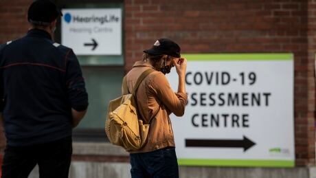 Long lines at testing centres, like this one pictured in Toronto on Sept. 16, 2020, mirror a spike in cases of COVID-19 provincial health officials link to people under 40 not following public health guidelines at social gatherings. COVID-19 testing Ontario long lines Toronto